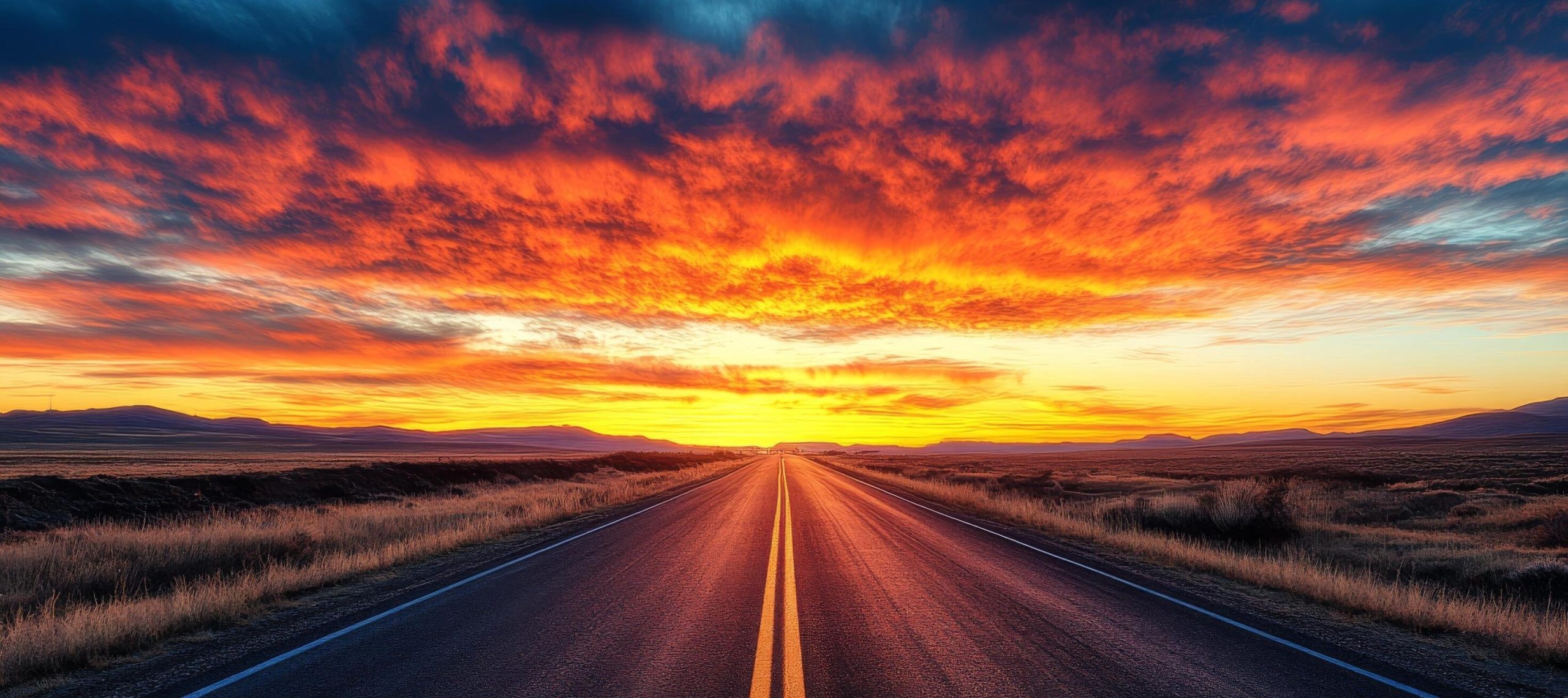 vibrant-sunset-painting-the-sky-with-colors-over-an-open-road-stretching-towards-the-horizon-free-photo (1)